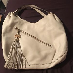 White leather Michael Kors purse.